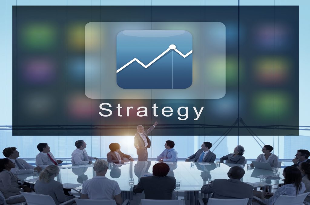 Business simulations for decision making illustrated with a corporate team discussing strategy and improving decision-making skills.